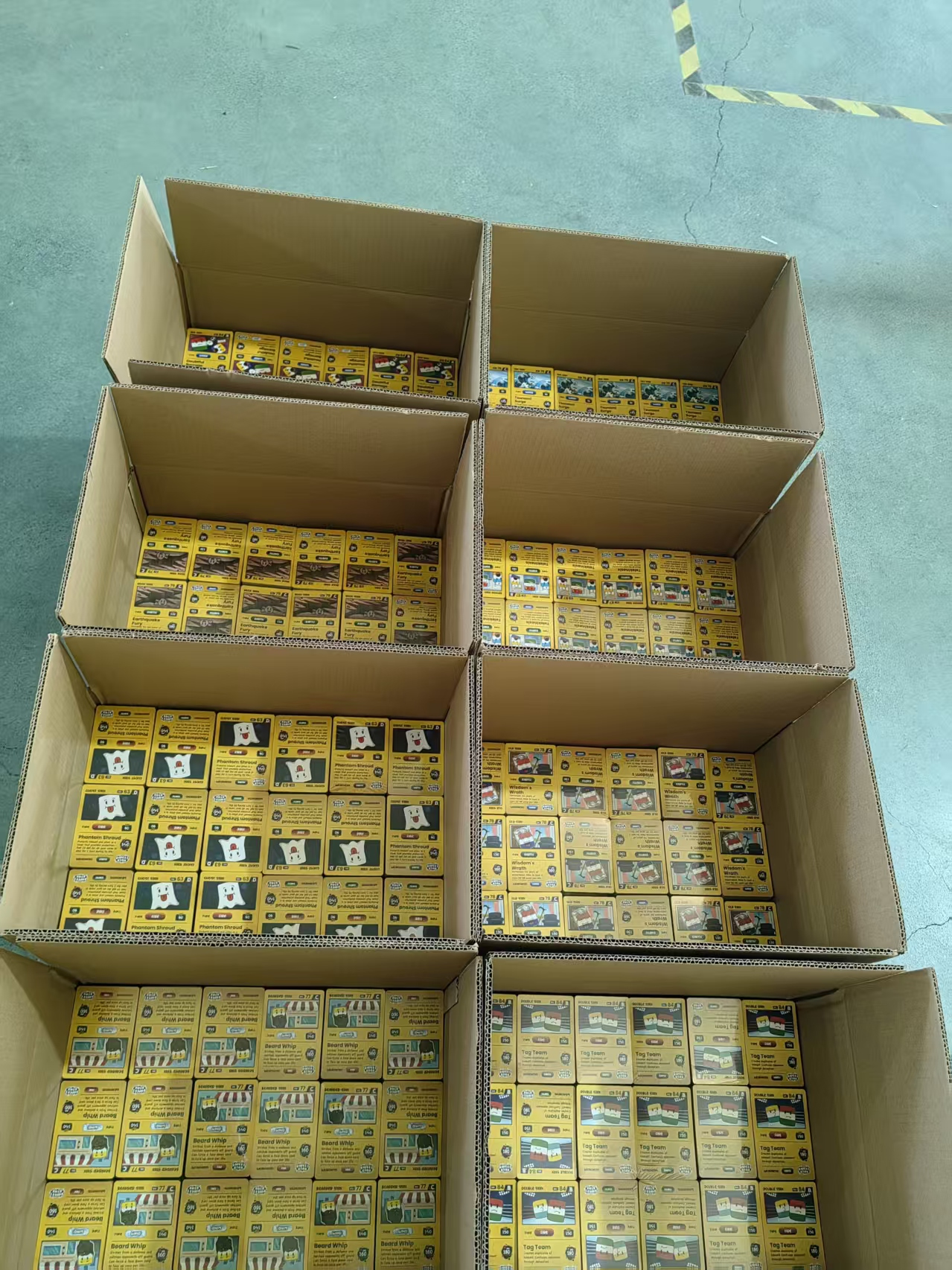 Custom trading card boxes ready for shipping at Salon Paper facility