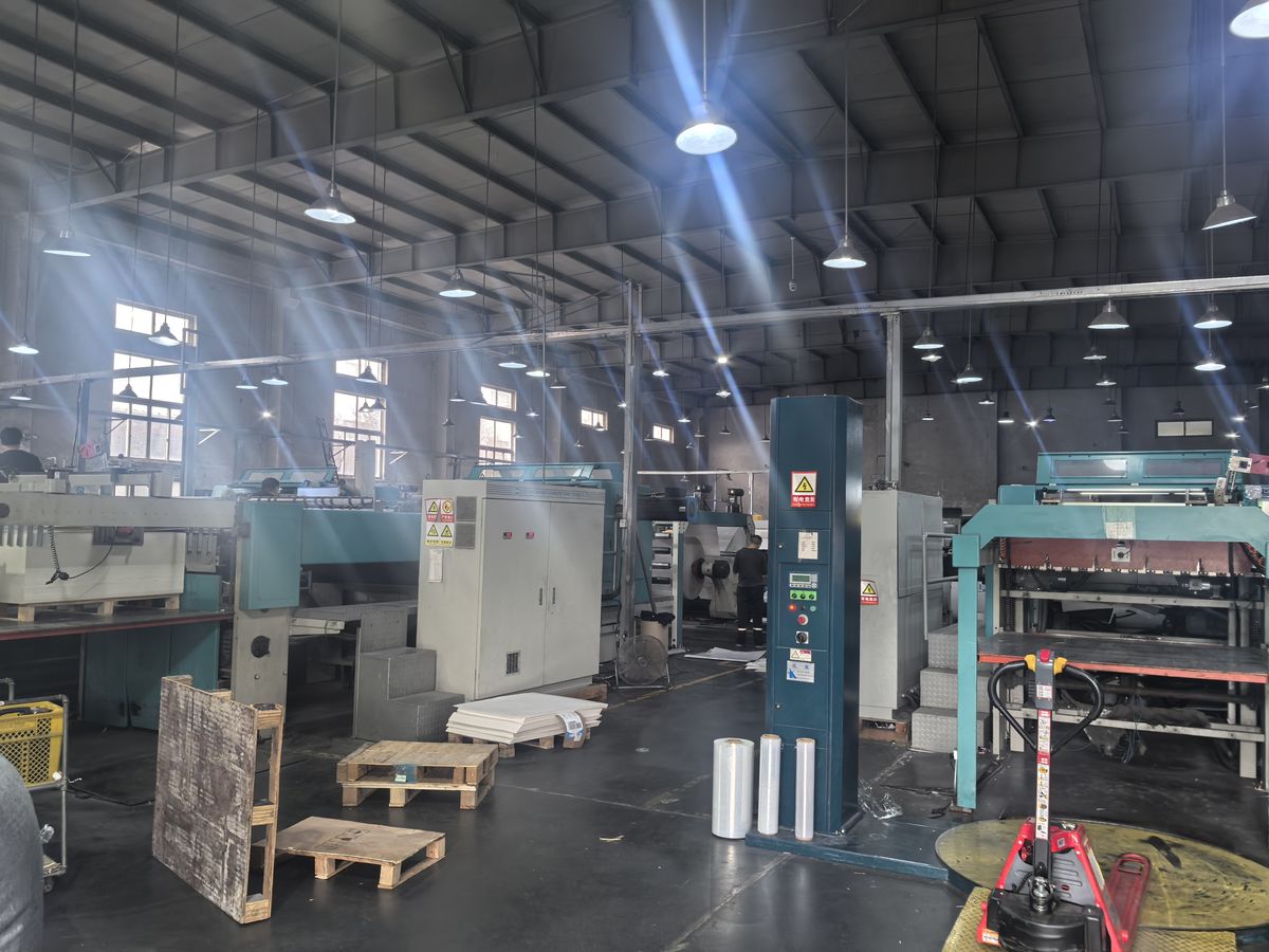 Factory workshop with packaged paper products ready for export